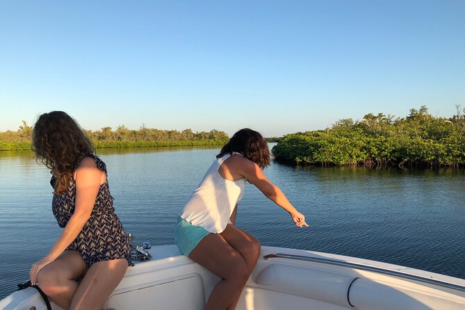 Half Day Private Boat Charter in Grand Cayman - Camana Bay pickup and the first hour afloat