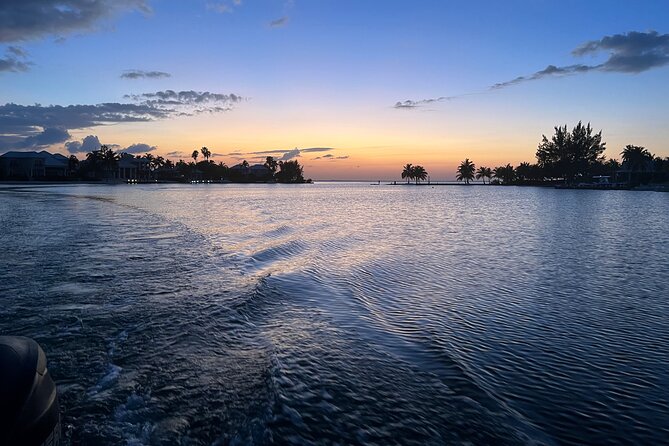 Private: Bioluminescence Tour - Leaving Camana Bay after sunset