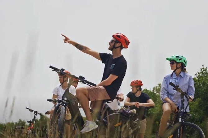 Small Group E-Bike Grand Cayman Ecological Half-Day Tour - Seven Mile Beach Starts the Story